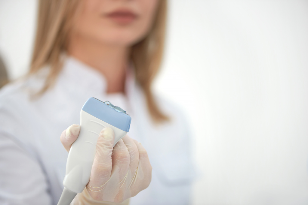 close-up-ultrasonography-equipment-female-doctor-hand.jpg