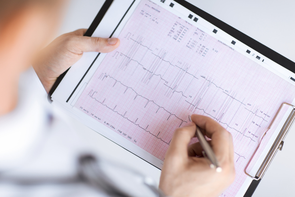 bright-picture-male-doctor-hands-with-cardiogram.jpg