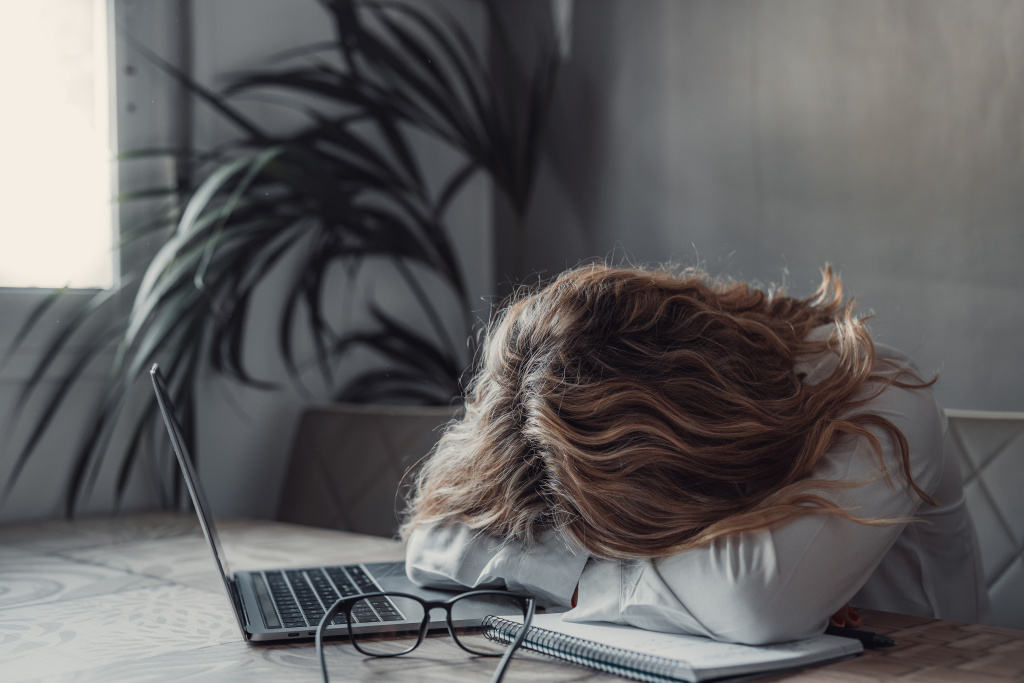 exhausted-young-caucasian-female-employee-sleep-desk-office-overwork-preparing-report-tired-woman-fall-asleep-doze-off-workplace-work-late-meet-deadline-fatigue-exhaustion-conceptxa.jpg