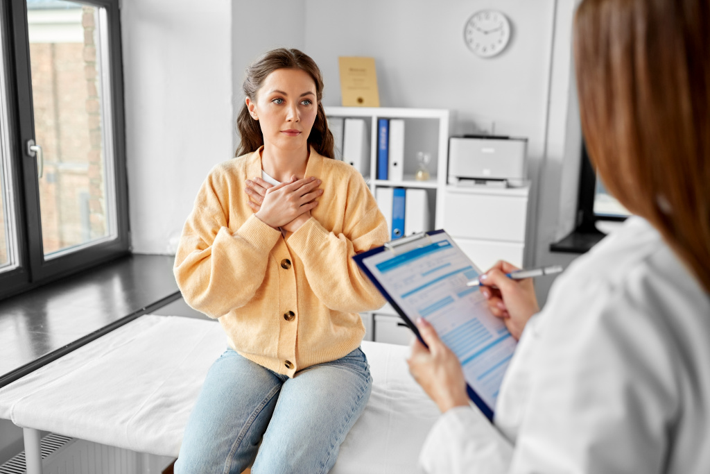 doctor-with-clipboard-woman-hospital.jpg